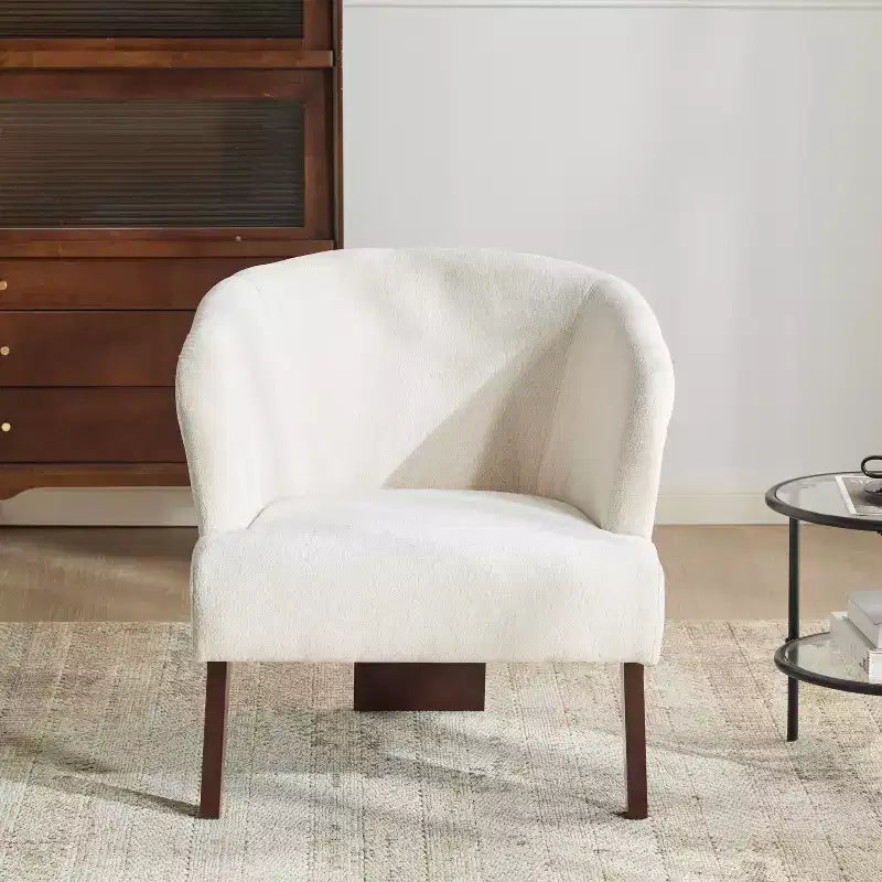 Poltrona d'accento con schienale rotondo e gambe in legno