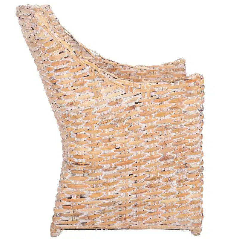 Poltrona in rattan con cuscino in cotone