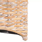Poltrona in rattan con cuscino in cotone