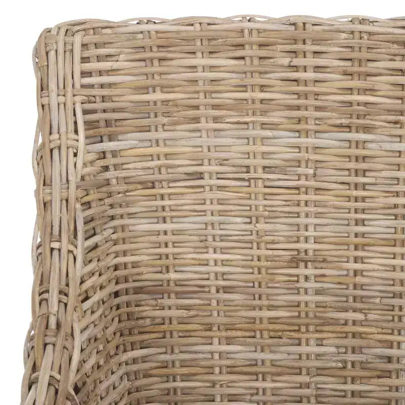 Poltrona in rattan con cuscino in cotone