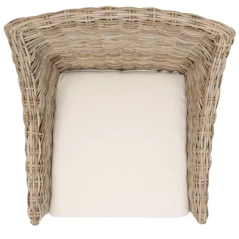 Poltrona in rattan con cuscino in cotone