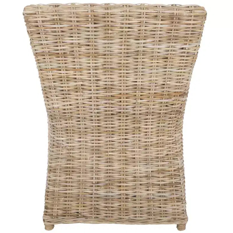 Poltrona in rattan con cuscino in cotone