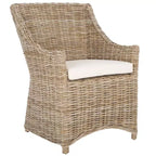 Poltrona in rattan con cuscino in cotone