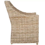 Poltrona in rattan con cuscino in cotone
